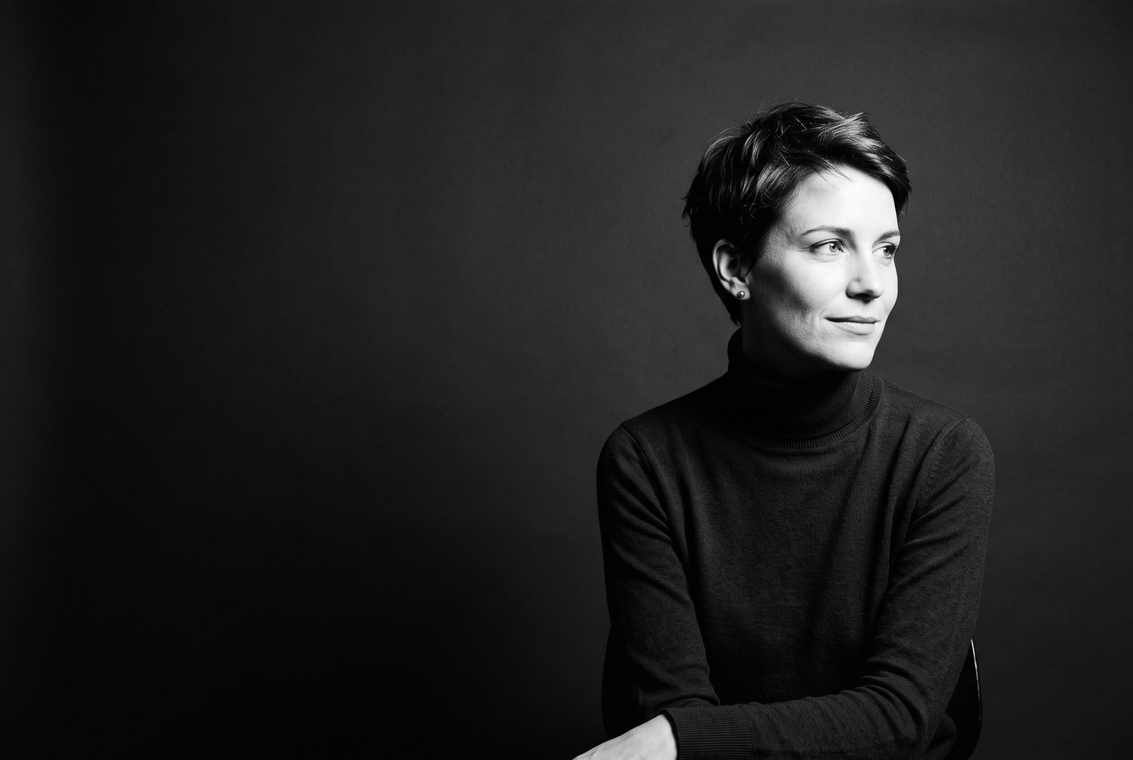 Black and white portrait of a woman looking off-camera